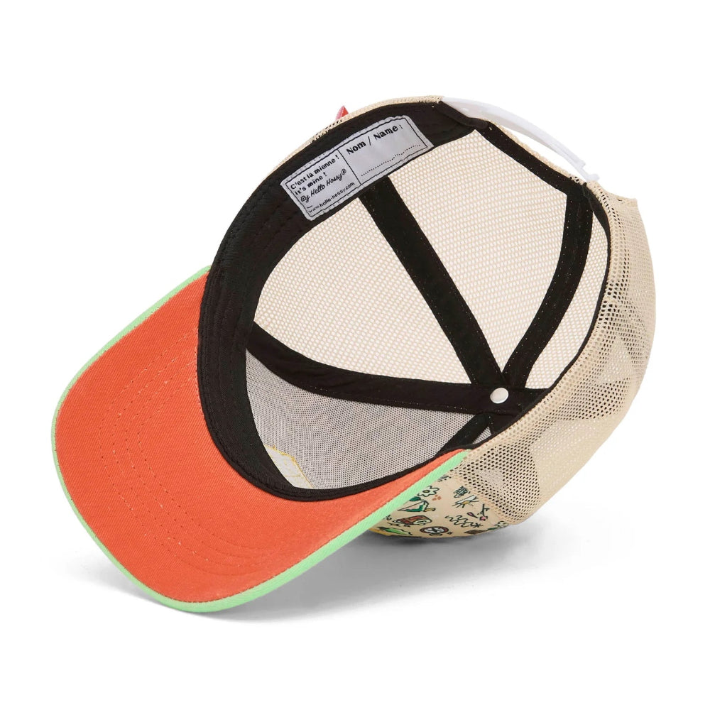 Binnenkant van de Adventure pet met zwarte banden, beige mesh en een oranje onderzijde van de klep.