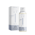Naïf Milky Badolie voor Baby & Kids in een fles van 100 ml met witte dop, naast de verpakking